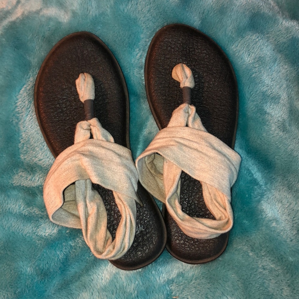Gray and black Sanuk sandals